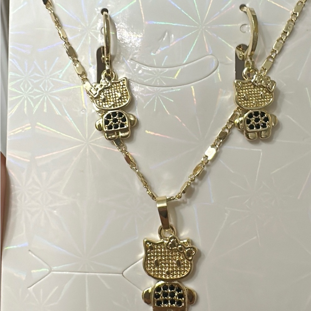 Gold and Black Necklace with Cat and Peace Charms